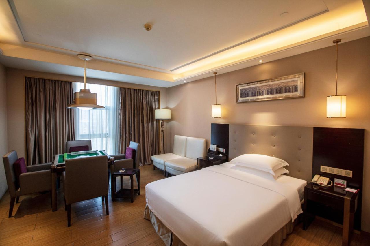 Hotel Ramada Yiyang Taojiang Esterno foto