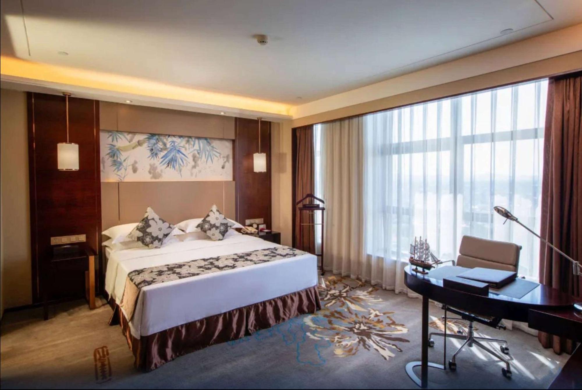 Hotel Ramada Yiyang Taojiang Esterno foto
