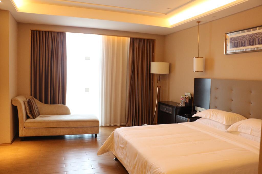 Hotel Ramada Yiyang Taojiang Esterno foto