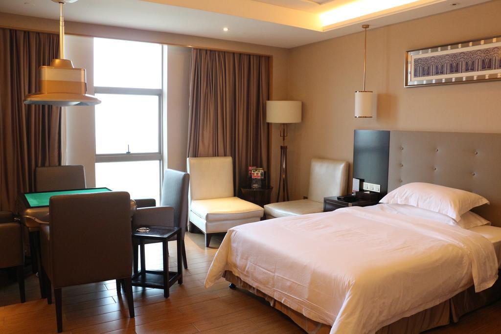 Hotel Ramada Yiyang Taojiang Esterno foto