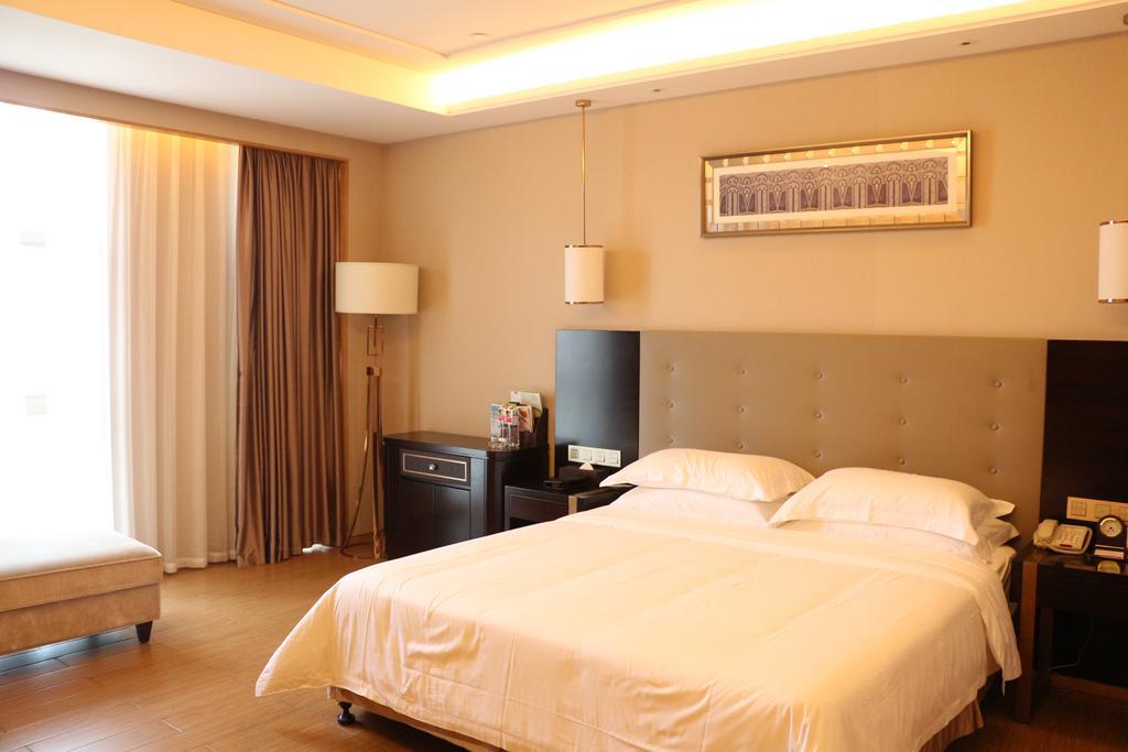 Hotel Ramada Yiyang Taojiang Esterno foto