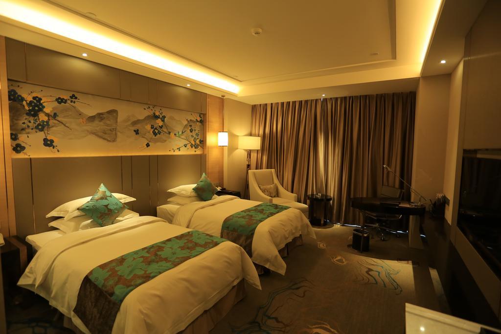 Hotel Ramada Yiyang Taojiang Esterno foto