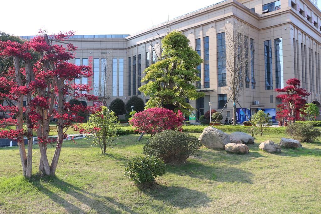 Hotel Ramada Yiyang Taojiang Esterno foto
