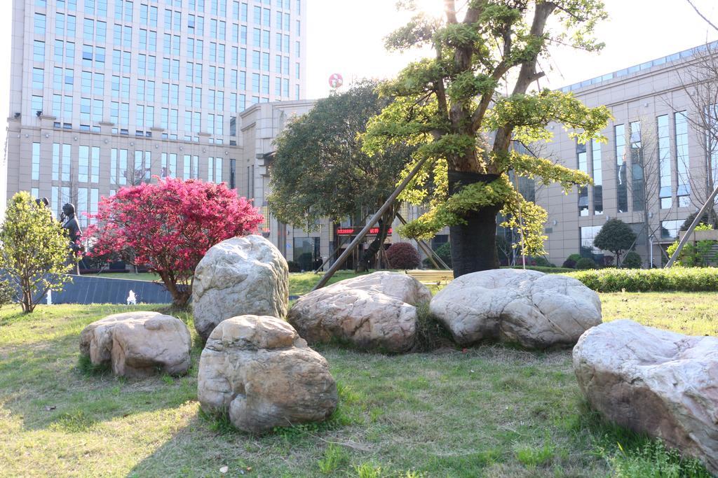 Hotel Ramada Yiyang Taojiang Esterno foto