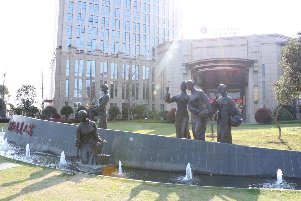 Hotel Ramada Yiyang Taojiang Esterno foto