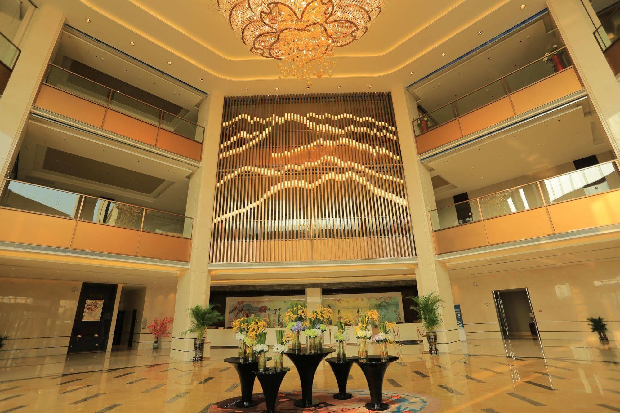 Hotel Ramada Yiyang Taojiang Esterno foto