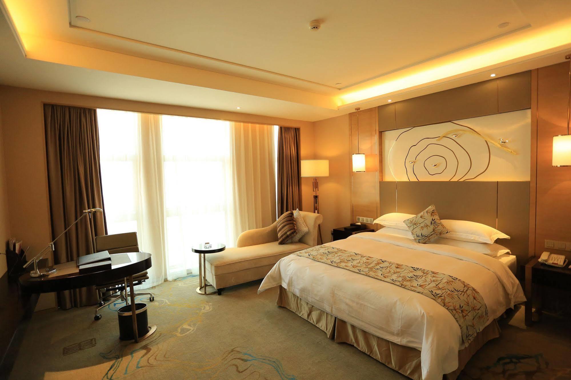 Hotel Ramada Yiyang Taojiang Esterno foto
