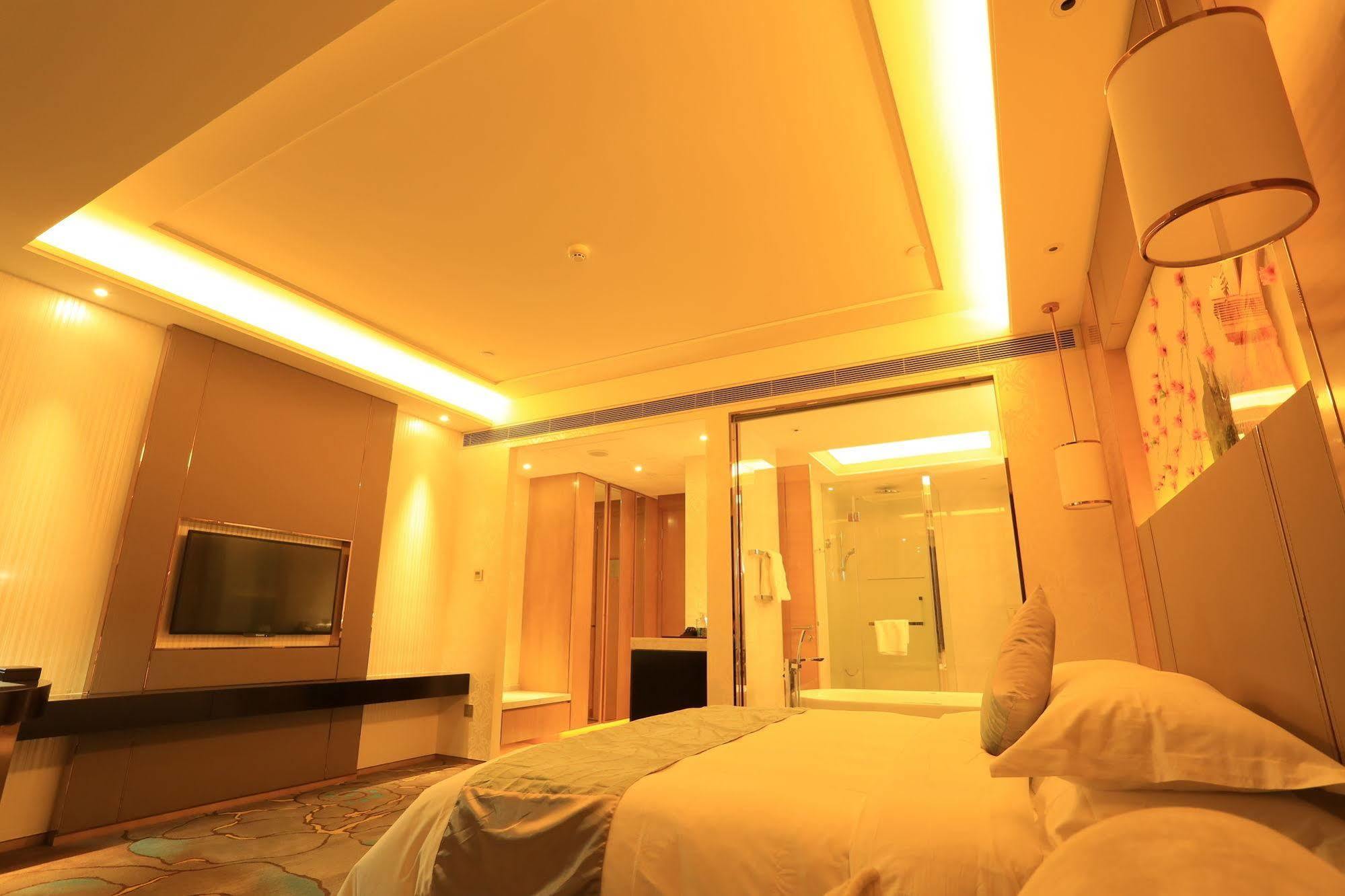 Hotel Ramada Yiyang Taojiang Esterno foto