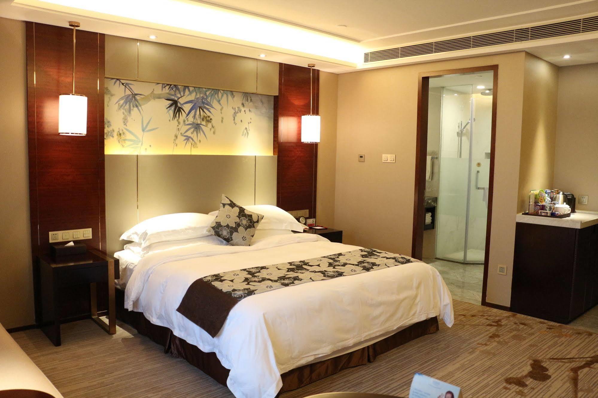 Hotel Ramada Yiyang Taojiang Esterno foto