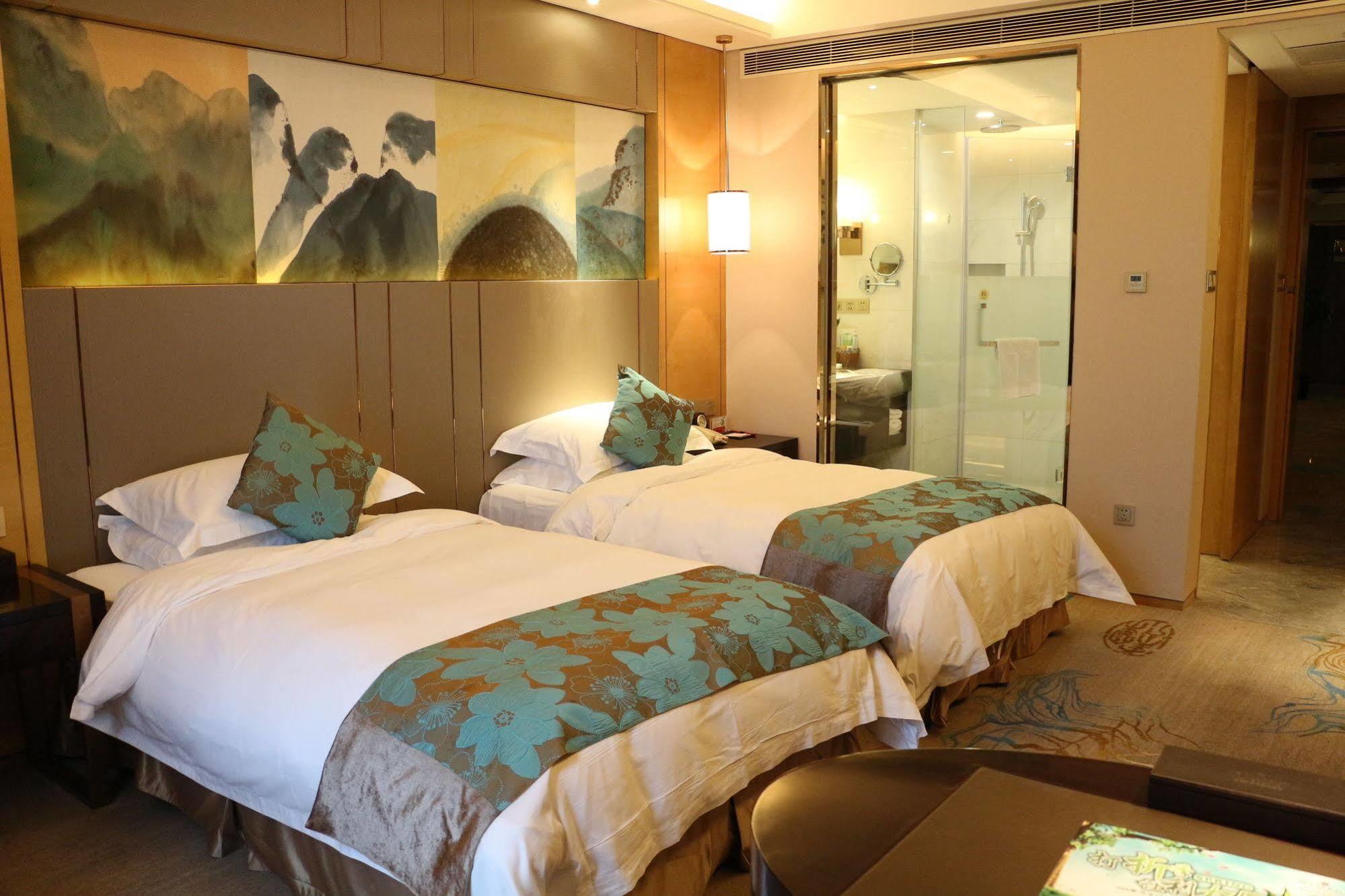 Hotel Ramada Yiyang Taojiang Esterno foto