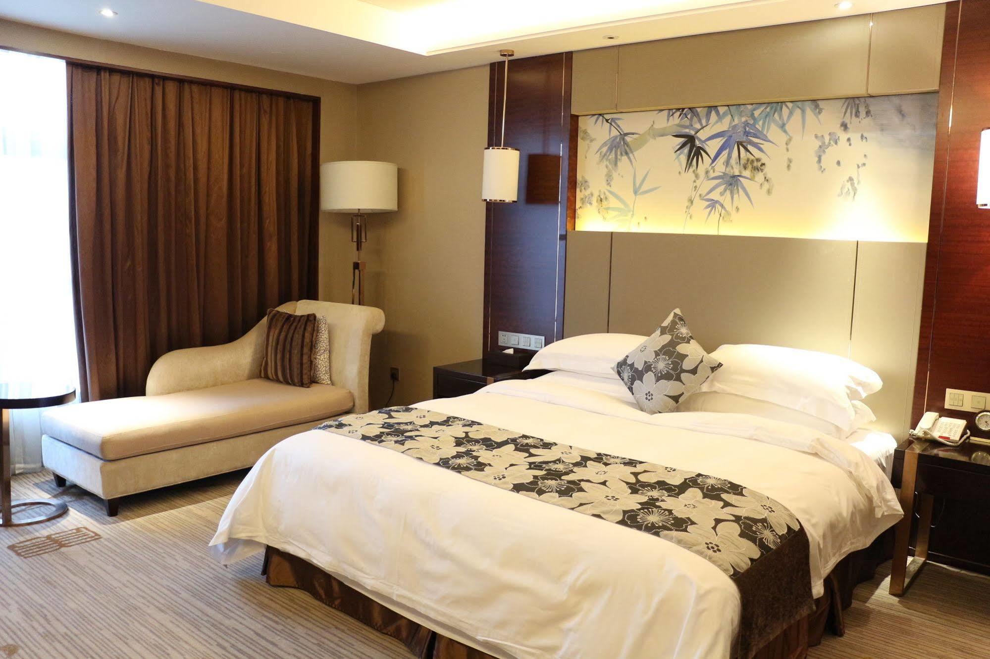 Hotel Ramada Yiyang Taojiang Esterno foto